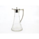 A George V period glass and silver mounted claret jug by James Deakin & Sons, with tapered cut glass