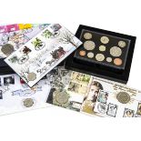 A collection of modern Royal Mint proof coins and Royal Mail Coin First Day Covers