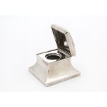 A late Victorian silver inkwell from Mappin Bros, square form, with glass liner, marks worn, some