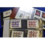 A collection of vintage and modern postcards, including two shoe boxes and an album with 20th