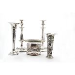 A late Victorian silver pierced and filled trumpet vase, together with another silver filled trumpet