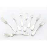 A harlequin set of eight George III and IV silver dinner forks, all fiddle pattern, six appear to