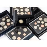 A collection of modern Royal Mint proof sets and other items, including several Royal Mail mint