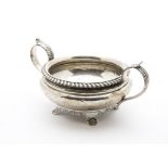 A George III silver sugar basin, Possibly by CR DR, with twin acanthus leaf handles, bearing