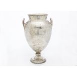 A large Victorian silver sporting trophy, bulbous tapering body with flared neck and twin handles,