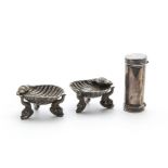 A pair of Victorian silver shell shaped table salts by George Unite, together with a Georgian silver