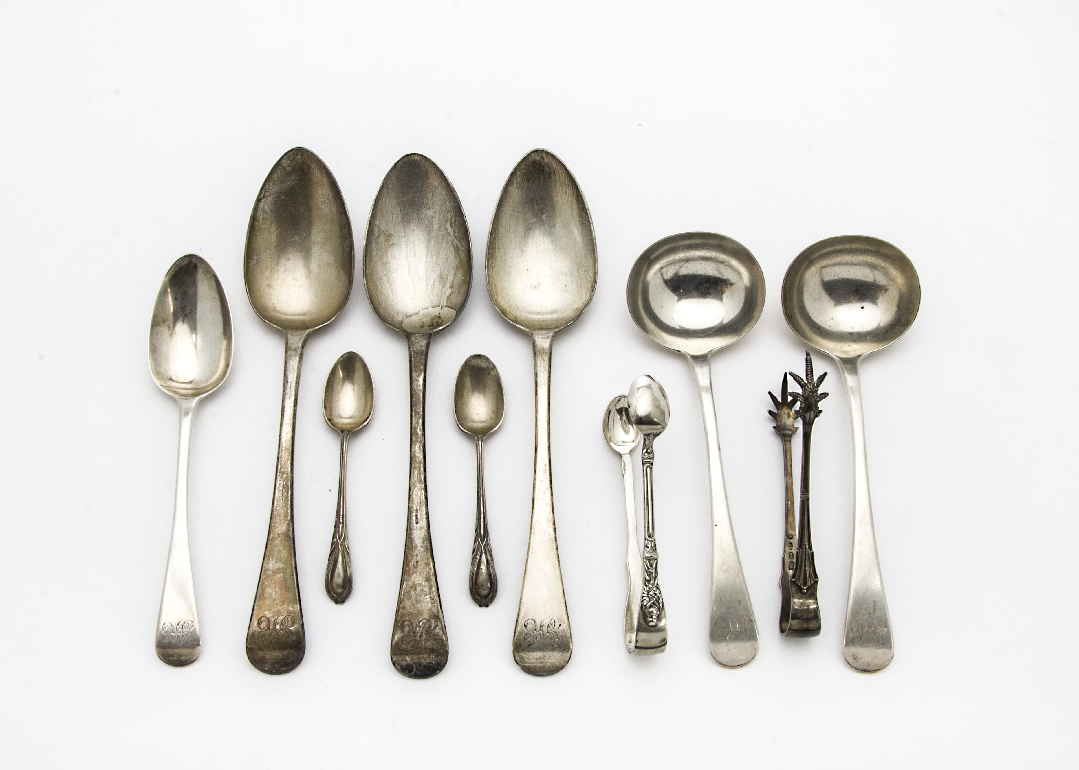 A set of six George III silver dessert spoons by William Eley & William Fearn, old English pattern