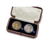 A George VI Coronation two medallion set, presented in a red fitted case, with bronze and silver