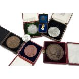 A collection of 19th and 20th century medallions and other items, most cased, including an 1887