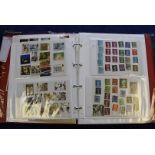 A collection of modern British stamps and other items, in eight folders and packets, including