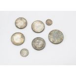 Seven good Victorian silver coins, including an 1887 double florin and 3 pence, and three 1888