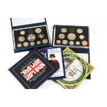 Four Royal Mint UK coin sets, together with three further UK sets, two crowns, a collection of First