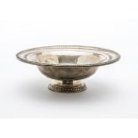 An Art Deco American silver footed bowl by Rogers, with feathered and pierced rim, weighted and 11