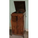 A cabinet gramophone, a rare HMV Model 14 (G.E.W.) in figured walnut case with Gramophone Co