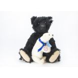 A Steiff limited edition black 1912 replica teddy bear, 1490 of 1912, in original box with