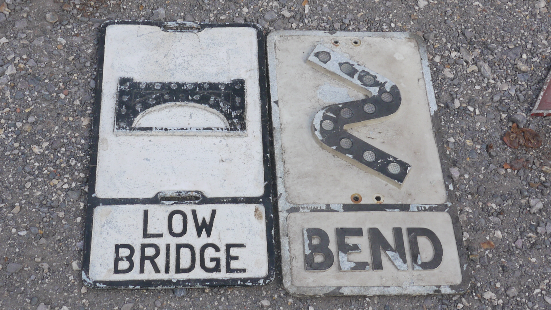 Low Bridge and S Bend Signs, A duo of original alloy post mounted road signs, black on white, one
