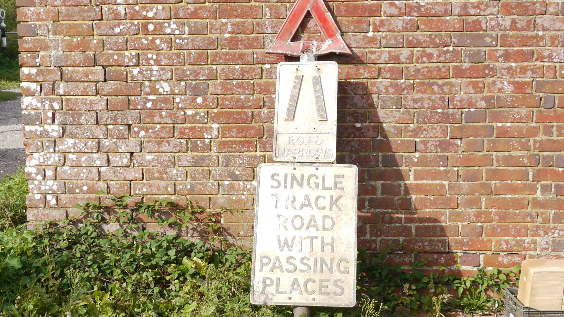 Post Mounted Single Track Signs, A trio of original alloy signs mounted on a post with post top