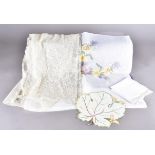 A collection of British, Indian and continental table linen, including embroidered napkins, lace