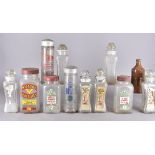 A collection of early and mid 20th Century advertising and shop display bottles including various