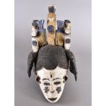 An Igbo Maiden Spirit mask, 51 cm high