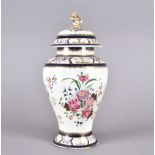 A 19th Century Sampson porcelain armorial jar and cover in the Chinese famille rose taste, of