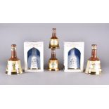 Two boxed commemorative Bells whisky decanters and contents to commemorate the birth of Prince