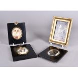 Two oval portrait miniatures, including one of Lady Hamilton, together with another, a silhouette,