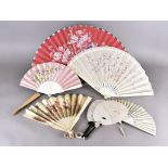 A Meiji period Japanese paper leaf and lacquered fan with watercolour decoration of quail within