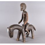 A Senufo figure on horse, Provenance: It was purchased at Christies 25/6/85 42cm high. One of the