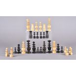 A 19th Century B & Co turned wood set of chess men in boxwood and ebonised wood