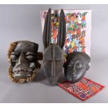 Three masks from the Ivory coast, Baule, We and a Bambara hyena mask, Along with a Ghanaian painting