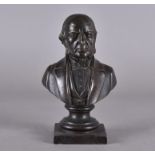A 19th Century spelter bronzed bust of Gladstone on socle and plinth base, 23 cm high