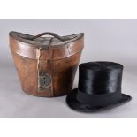 An Austin Reed silk top hat, in leather case, Size M, leather inner band