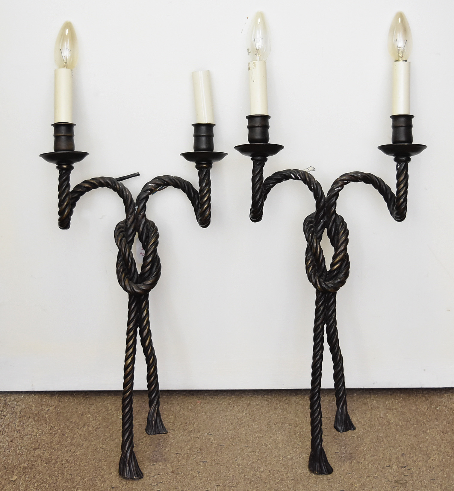 A pair of bronze hollow cast rope twist wall sconces, twin branch, 67 cm including bulb