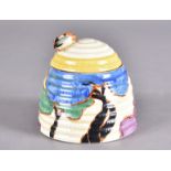 A Clarice Cliff Bizarre honey pot and cover, Blue Autumn (Balloon Trees) pattern, ribbed body,