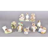 A collection of Beswick and Royal Albert Beatrix Potter figures including Benjamin Bunny, Mrs