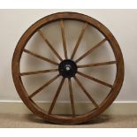 A Victorian oak and iron cart wheel, the central cog marked B566, 105 cm diameter