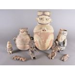Three Pre-Columbian figurative Chancay storage jars, and figure, all Peruvian. Together with four