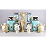 Five pairs of twin-handled Noritake vases, comprising a pair of squared form, blue heightened with