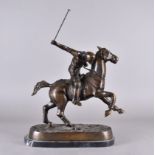 A modern equestrian bronze, modelled as a polo player on pony, on hardstone base, 39 cm high x 34 cm