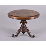 A 19th Century walnut miniature tripod table, the circular tilt top quarter veneered, inlaid with