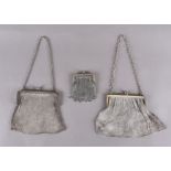 A silver chain mesh evening purse, 12 cm x 11 cm together with two silver plated examples (3)