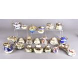 A collection of Noritake small jars with covers, various forms and decoration, approximately 22