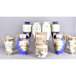 Six pairs of Noritake vases, comprising a pair of twin-handled ovoid form, blue ground heightened