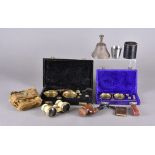 A pair of 1900's J H Steward ivory opera glasses together with two cased sets of travelling