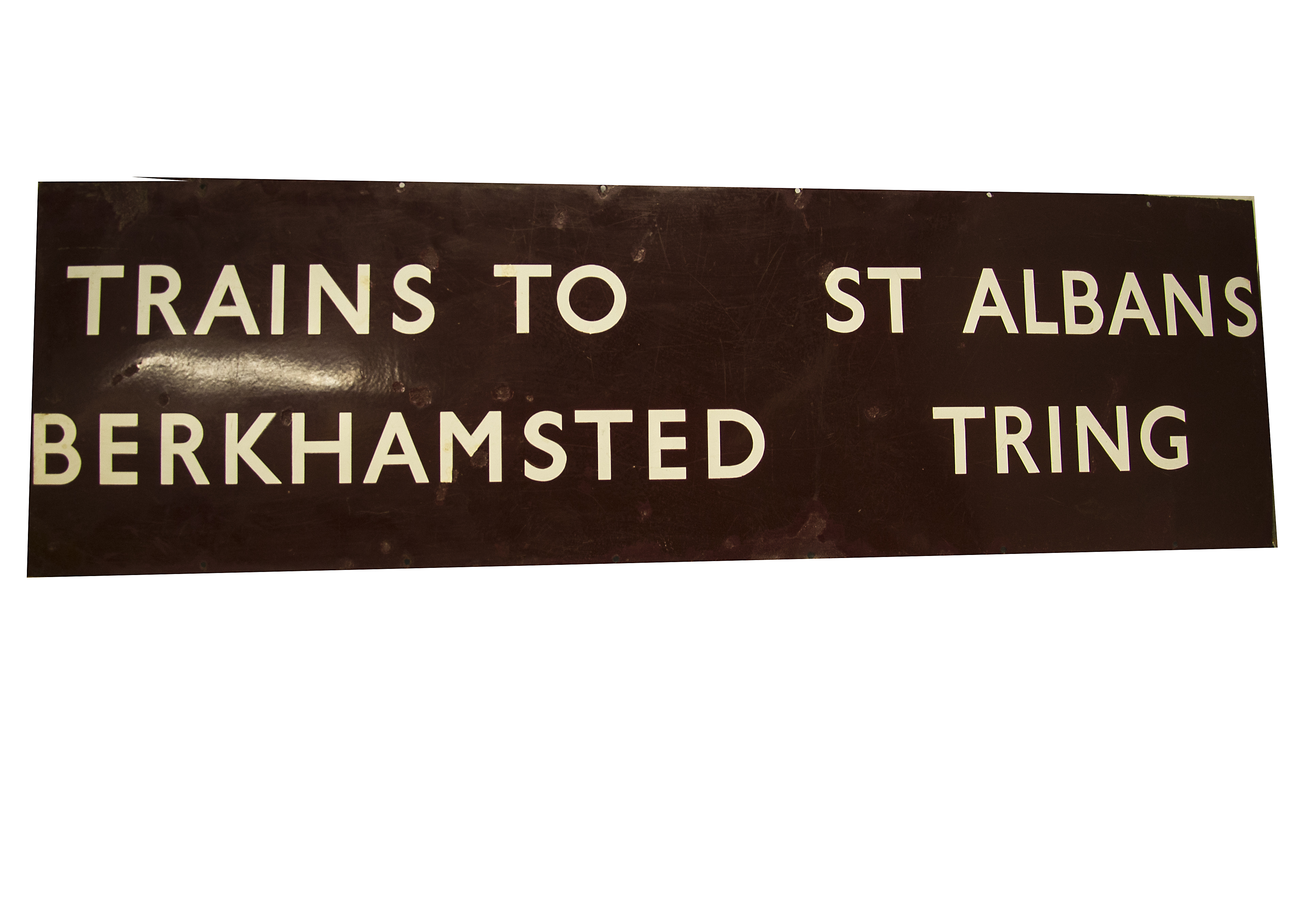 BR London Midland Region Station Sign, an enamelled sign wall mounted with white text on a maroon