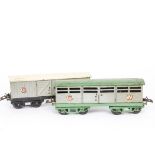Unboxed Hornby O Gauge GWR No 2 Van and Cattle Wagon, the van with black base and repainted cream