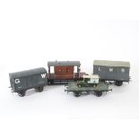 Four Gauge 1 Kit-built Freight Stock, comprising a BR bauxite brown brake van from metal kit, with a
