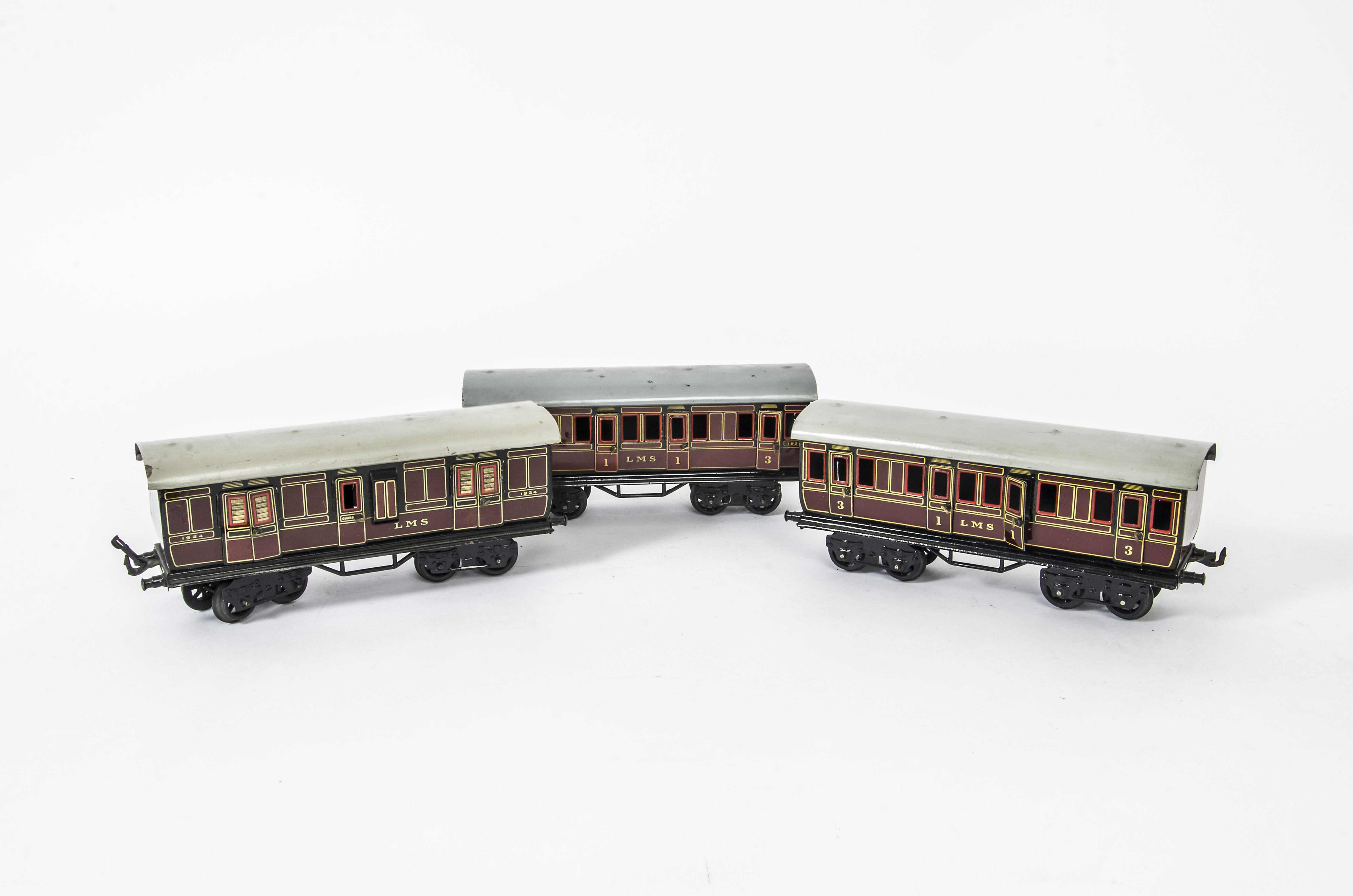 Three Fine Bing O Gauge LMS 'Shortie' Bogie Coaches, comprising two 1st/3rd composite coaches, (