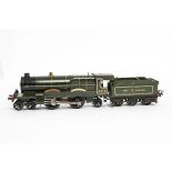 A Hornby O Gauge No 3 Clockwork Locomotive and Tender 'Caerphilly Castle', in GWR green as no